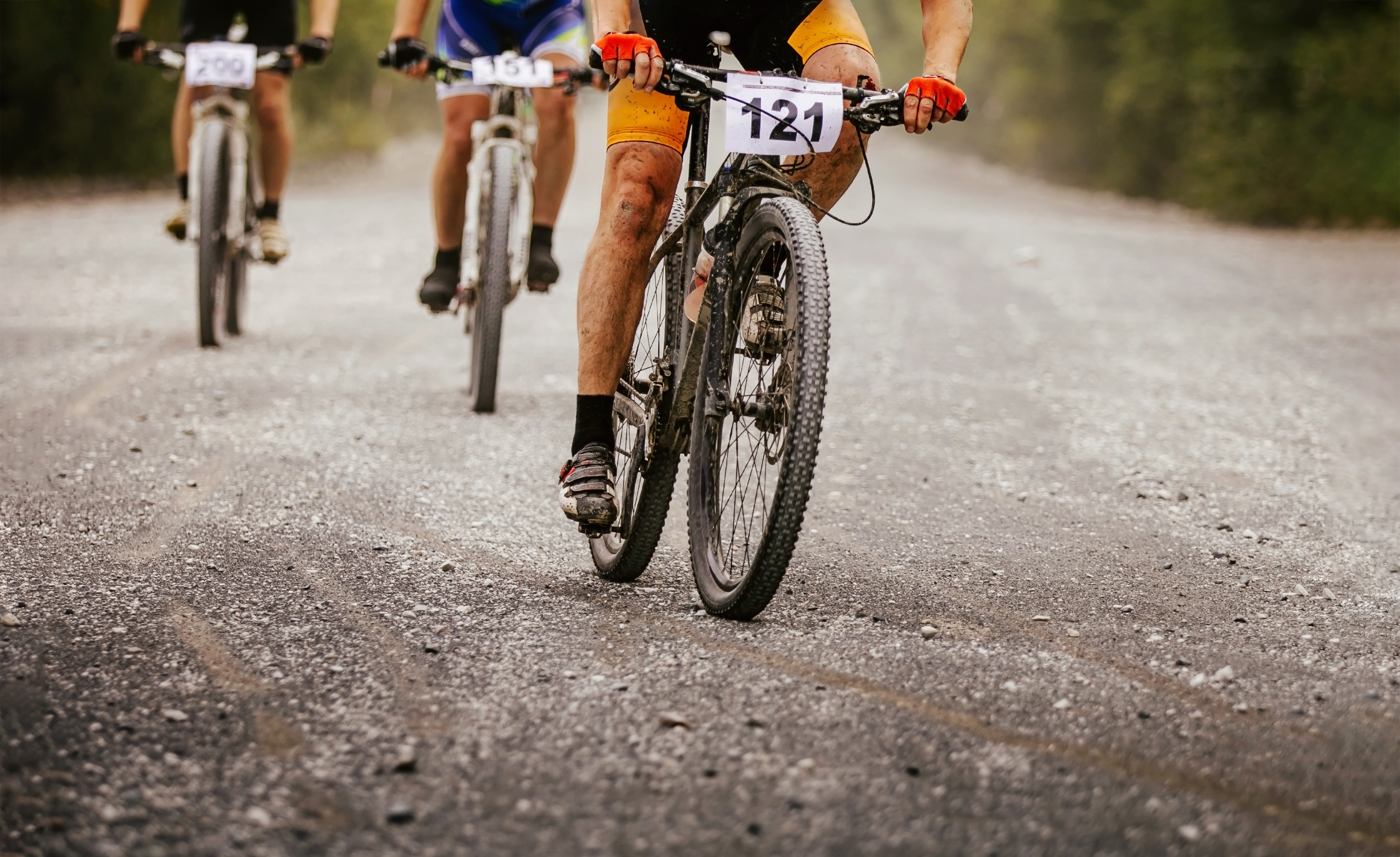 Cyclists racing on gravel